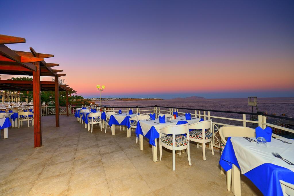 Stella Di Mare Beach Hotel & Spa Sharm el-Sheikh Exterior foto Sunset at the restaurant